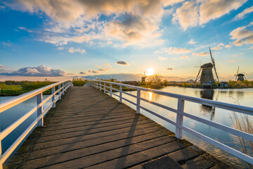 Fototapeta premium Traditional dutch windmill scenery at Kinderdijk. Netherlands 