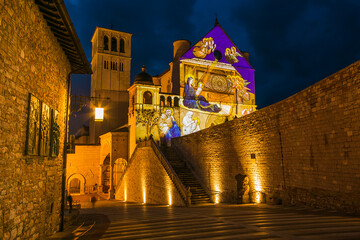 Amazing view of the famous Basilica of Saint Francis of Assisi at christmas time in Umbria, Italy