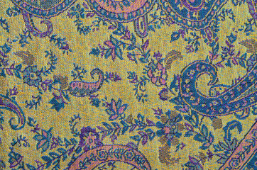 texture or background beautiful hand embroidered shawl with a pattern and lurex fashionable and stylish women's accessory close up