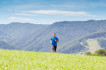 Man running at mountain background