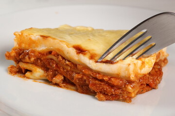 Eating Lasagne Bolognese