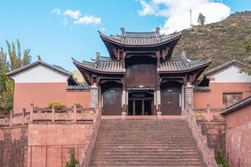 chinese tradintional house in village with blue sky and clous
