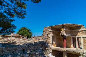 Old walls of Knossos near Heraklion. Detail of ancient ruins ruins of the Minoan palaces - largest archaeological site of all the palaces in Mediterranean island of Crete, UNESCO list, Greece
