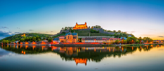 Sunset panorama of Marienberg Fortress reflecting in the river Main. Wurzburg, Bavaria, Germany