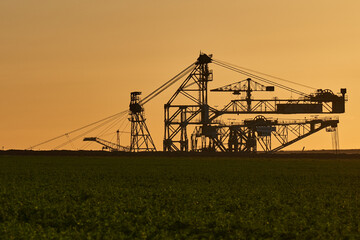 Fototapeta premium Coal mining excavators and the surrounding nature