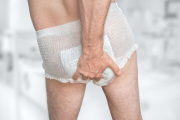 Man wearing incontinence diaper