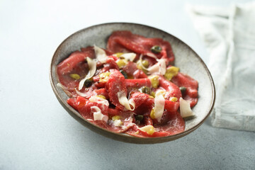 Traditional homemade beef carpaccio with capers