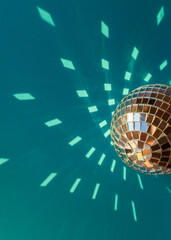 Mirror disco ball sun glare abstract blue background, banner, frame, postcard. Disco festive new year xmas winter theme.