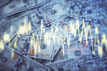 Double exposure of forex graph drawing over us dollars bill background. Concept of financial markets.