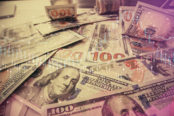 Multi exposure of forex chart drawing over us dollars bill background. Concept of financial success markets.