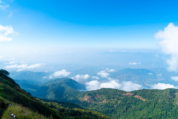 beautiful mountain layer with clouds and blue sky