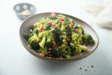 Broccoli with pomegranate seeds