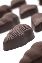 Closeup of chocolate collection on white background