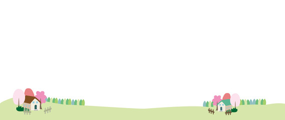 ピンク色になった花木がある田舎の風景