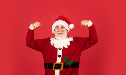 Fototapeta na wymiar Happy holiday. New year is coming. happiness and joy. ready for xmas party. celebrate winter holiday. funny man wear santa claus coat and hat. shopping. Merry Christmas and Happy Holidays