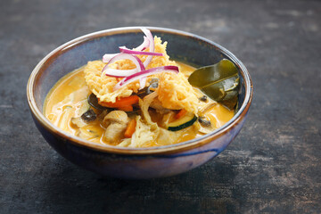 Curry, an aromatic dish of Thai cuisine. Colorful eastern cuisine
