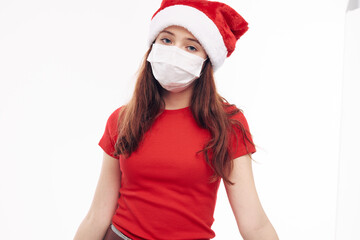 Fototapeta na wymiar cute girl medical mask red t-shirt close-up holiday new year 