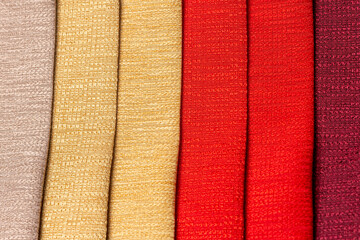 Beige, gold yellow, red and Bordeaux interior design sample color swaps of textured curtain fabric