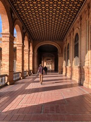 Walkway through old architectural building Sevilla Spain