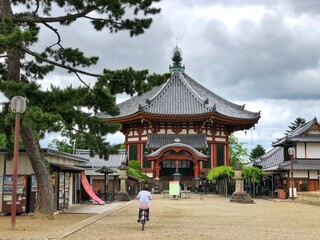 Japanese Shrine or Temple with traditional cyclist