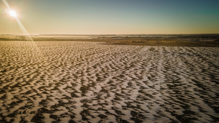 Fototapeta premium patterns made by wind and snow in the fields