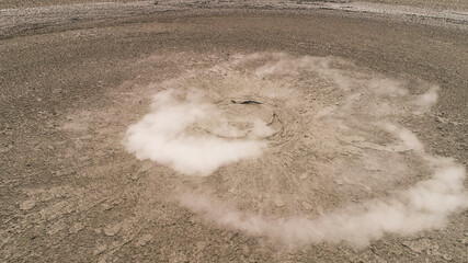 Mud volcano with bursting bubble bledug kuwu. aerial view volcanic plateau with geothermal activity and geysers, Indonesia java. aerial view volcanic landscape