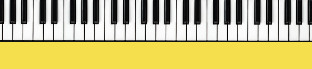 Naklejka premium Synthesizer keyboard in trendy yellow color 2021