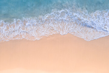 (Top view) Aerial view drone over beach sea. Beautiful sea waves. Beach sand and amazing sea. Summer sunset seascape. Phuket Thailand Beach. Water texture. Top view of the fantastic natural sunsets