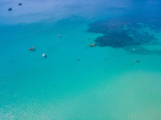 Aerial view Nature sea. Turquoise Sea and White beach sand in copy space, Aerial view of drone, Seawater clear and blue green. Nature in Khai Island. At Khai island, Phuket, Thailand. Travel concept.