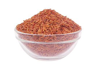 Red rice in glass bowl isolated on white