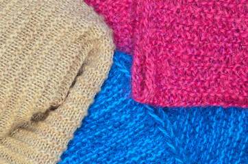 Fototapeta na wymiar colored knitted warm wool texture or background close-up