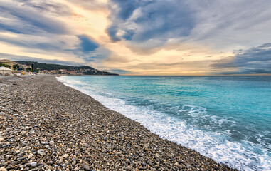Sunrise over the beach and the sea in Nice, France