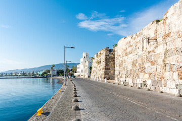 Naklejka premium Town Harbour and Neratzia Castle wall view in Kos Island. Kos Island is populer tourist destination in Greece.