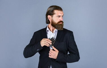 looking away. Brutal businessman drinking alcohol. Man with his booze flask. man drinks strong alcohol from iron flask while relaxing. Hip flask for whiskey. vintage gentleman gift shop