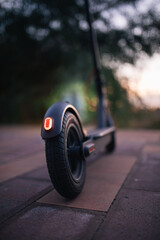 scooter from the back. Lights on. Concept technology.Transport © Felix
