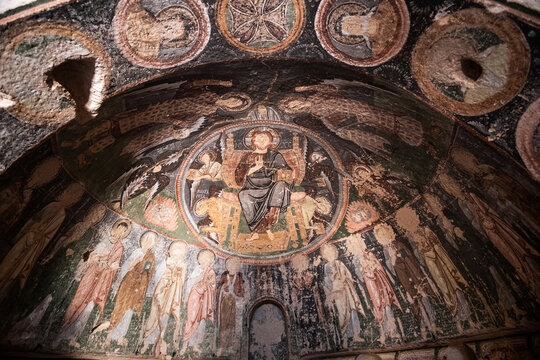 Dome of cave church with holy paintings in Cappadocia, Turkey