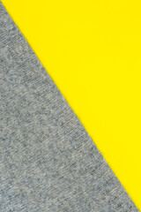 The background is divided diagonally into two colors: yellow and gray. Demonstration of trendy...