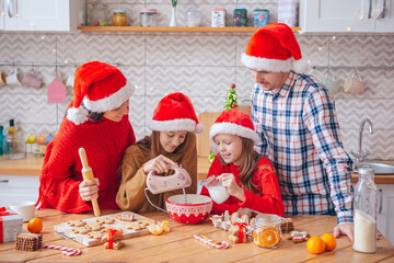 Happy family bake cookies for Christmas