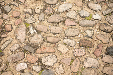 Large, granite blocks street cobblestone pattern. 