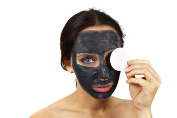 woman removes a cosmetic mask from her face. Skin care, Spa treatments
