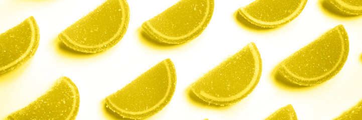 citrus jelly slices in sugar. marmalade slices of oranges isolated on a white background. repeating...