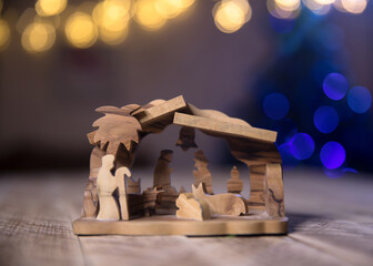 nativity scene on wooden background