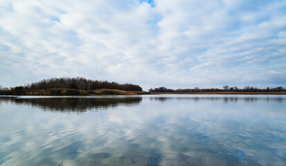 autumn landscape. view of opposite bank of river. cloudy weather.