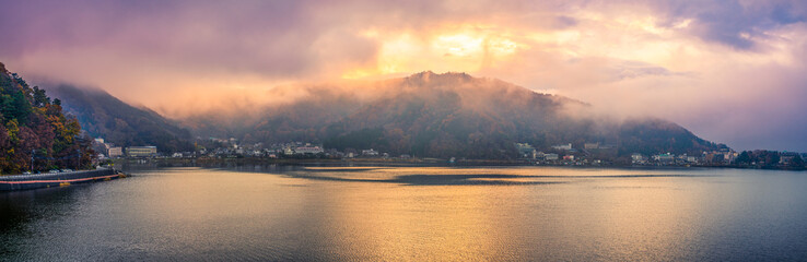 Sunrise panorama of Fujikawaguchiko town near Kawaguchi lake with morning mist. Japan