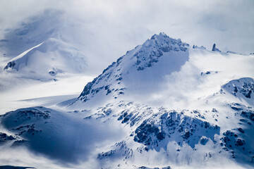 Dramatic snow capped mountain peaks of Elephant Island off the coast of Antarctica - obrazy, fototapety, plakaty