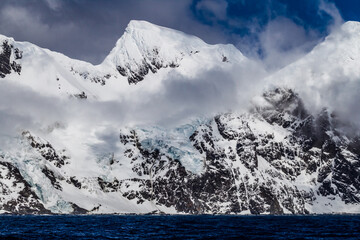 Dramatic snow landscapes rise out of the ocean in Antarctica