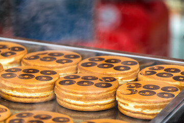 Obanyaki also known as Imagawayaki. Japanese dessert often found at Japanese festivals as well as outside Japan. It is made of batter in a special pan