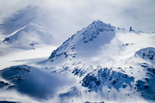 Dramatic snow capped mountain peaks of Elephant Island off the coast of Antarctica