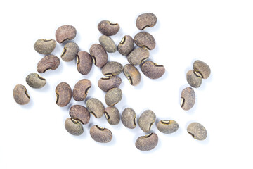 Top view of dry gray beans on a white background