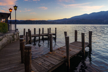 Wooden pier on lake Orta, Piedmont, Italy